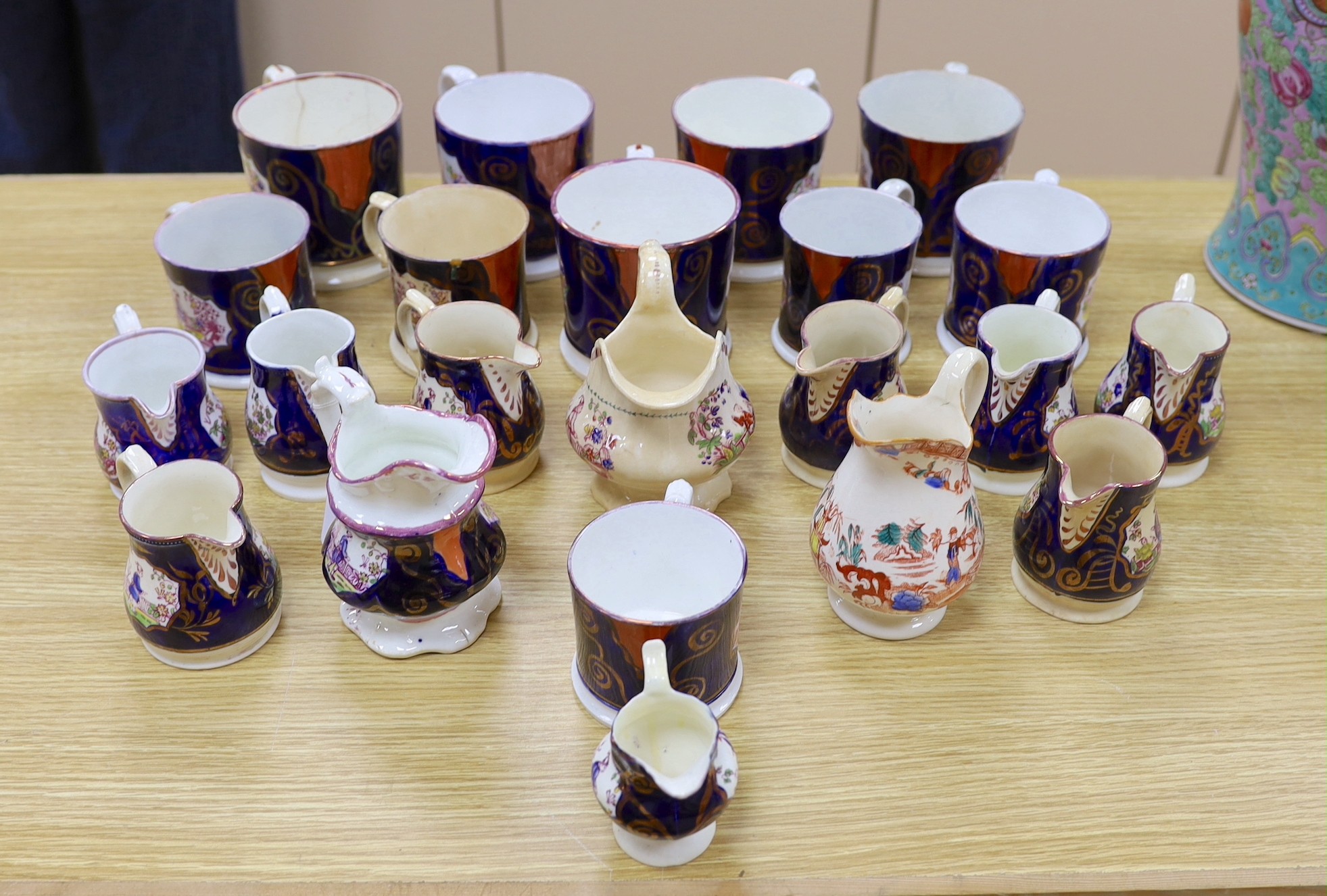 A quantity of Gaudy Welsh lustre jugs and mugs with chinoiserie motifs